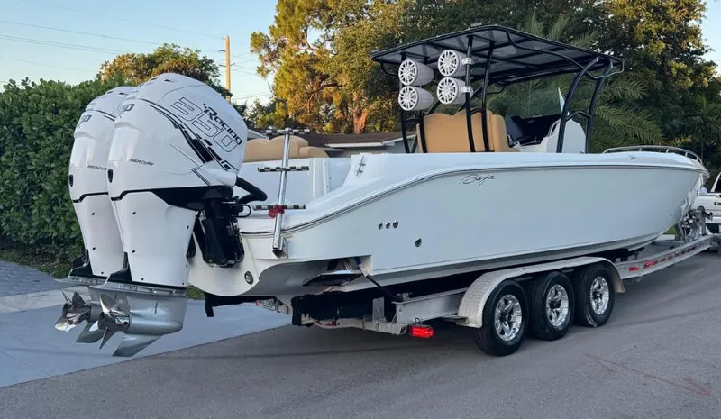 Slide: The Image of Chrome anchor winch on 2002 Baja 340 Islander Outboard boat deck. - 11
