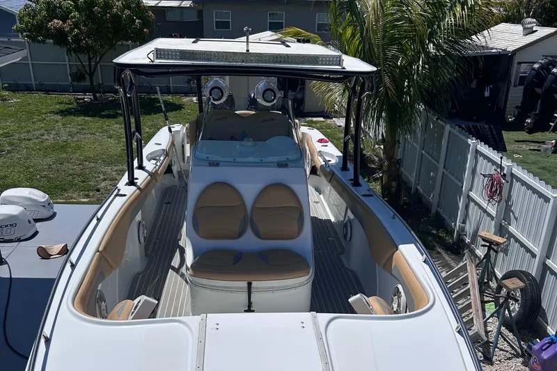 Slide: The Image of Control panel of a 2002 Baja 340 Islander Outboard with navigation and engine displays. - 7