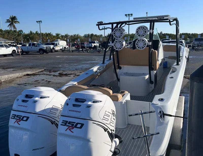 Slide: The Image of Chrome anchor winch on 2002 Baja 340 Islander Outboard boat deck. - 12