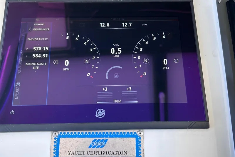 Slide: The Image of Outboard engines on a 2002 Baja 340 Islander, featuring "Racing 350" branding. - 5