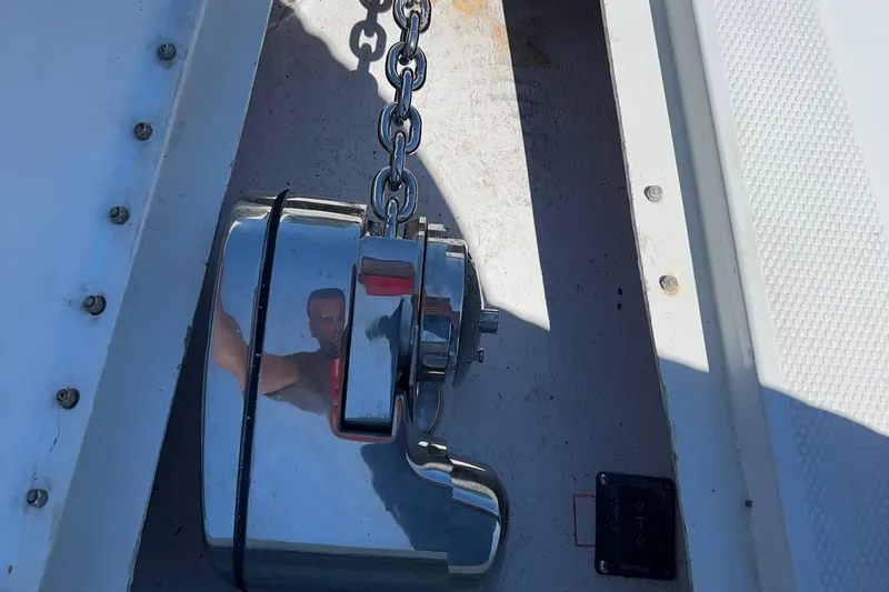 Slide: The Image of Dashboard of a 2002 Baja 340 Islander Outboard showing engine hours and maintenance data. - 8