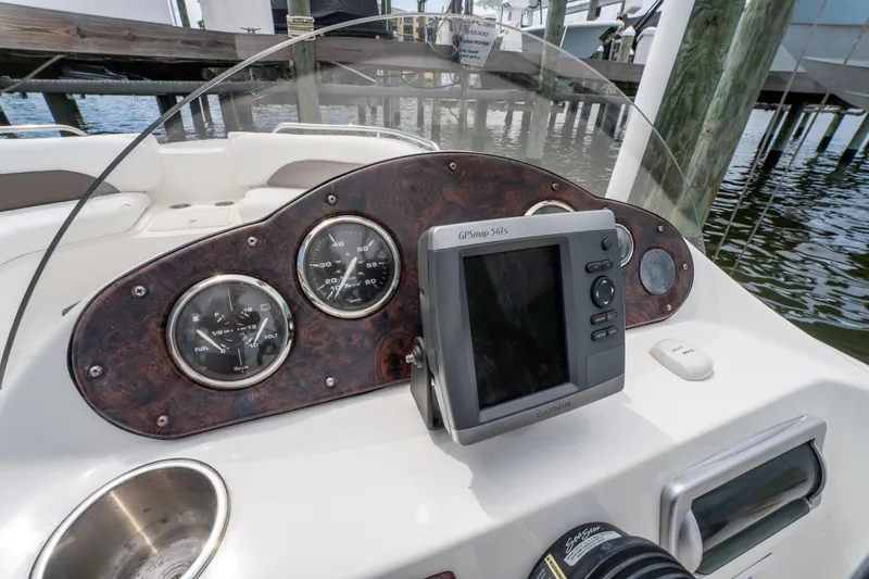 Slide: The Image of 2013 Hurricane SunDeck Sport 201 OB dashboard with GPS and gauges. - 23