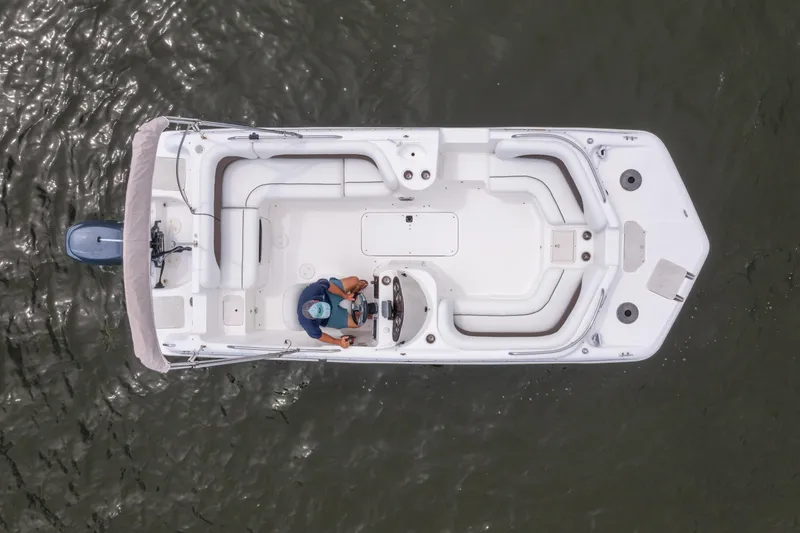Slide: The Image of Overhead view of 2013 Hurricane SunDeck Sport 201 OB boat on water. - 27