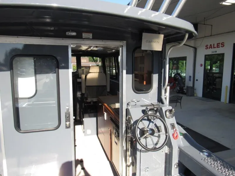 Slide: The Image of Hewescraft 270 Pacific Explorer 2026 - 12