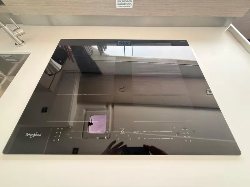 Slide: The Image of Modern Whirlpool induction cooktop on Fountaine Pajot Aura 51 yacht, 2023 model. - 11