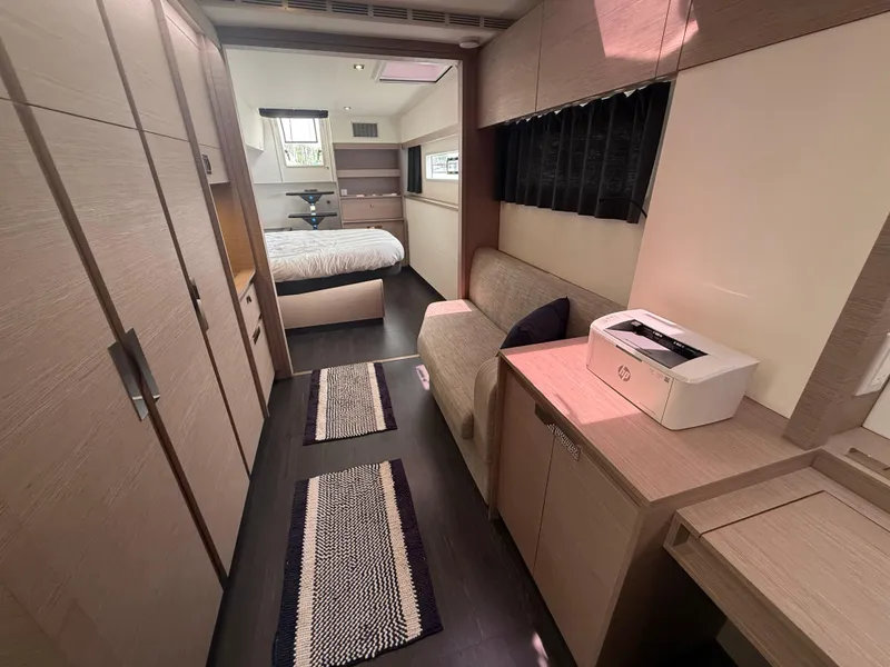 Slide: The Image of Luxurious interior of 2023 Fountaine Pajot Aura 51 yacht with modern furnishings and cozy bedroom. - 23