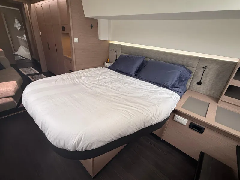 Slide: The Image of Luxurious bedroom interior of 2023 Fountaine Pajot Aura 51 yacht with modern design. - 29