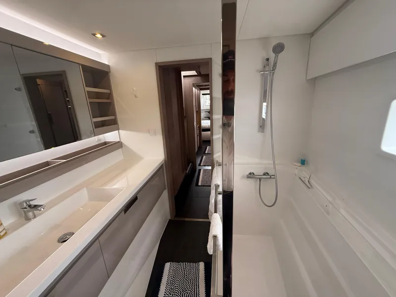 Slide: The Image of Luxurious bathroom interior of 2023 Fountaine Pajot Aura 51 yacht, featuring modern fixtures and sleek design. - 35