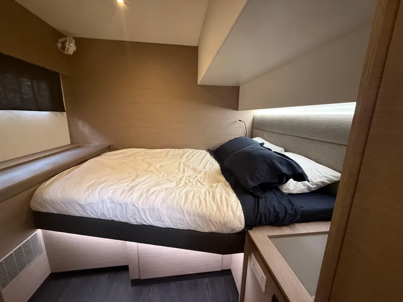 Slide: The Image of Luxurious bedroom interior of 2023 Fountaine Pajot Aura 51 yacht, featuring a cozy bed. - 39