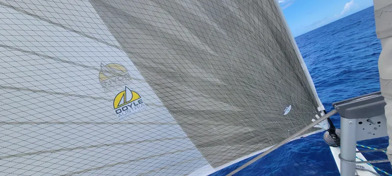 Slide: The Image of Sailing on a 2023 Fountaine Pajot Aura 51 with Doyle sail in open ocean. - 44