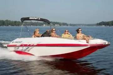 Slide: The Image of 2017 Starcraft Star Step 221 OB boat cruising on a lake with passengers. - 11