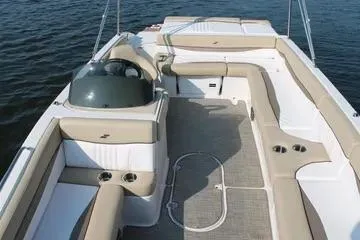 Slide: The Image of 2017 Starcraft Star Step 221 OB boat interior with beige seating and open deck layout. - 13