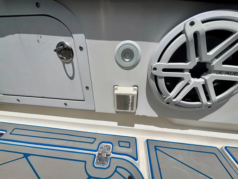 Slide: The Image of 2007 Midnight Express 39 Cuddy boat interior with speaker and storage compartment. - 47