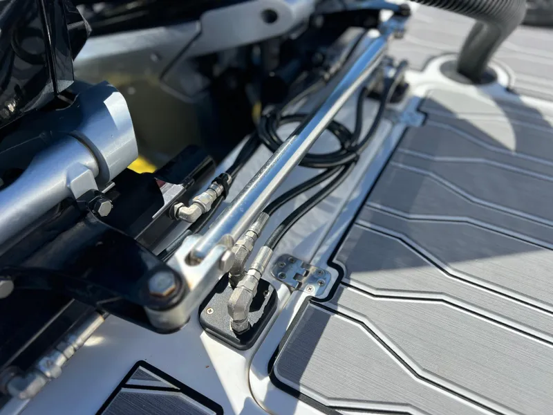 Slide: The Image of Close-up of 2023 Sunsation 32 CCX boat engine components and deck details. - 26