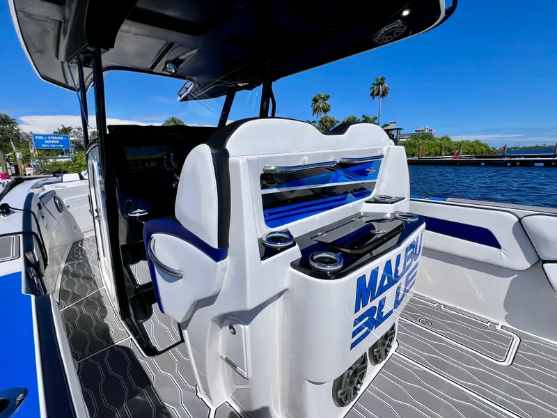 Slide: The Image of 2023 Sunsation 32 CCX boat interior with sleek seating and modern design. - 31
