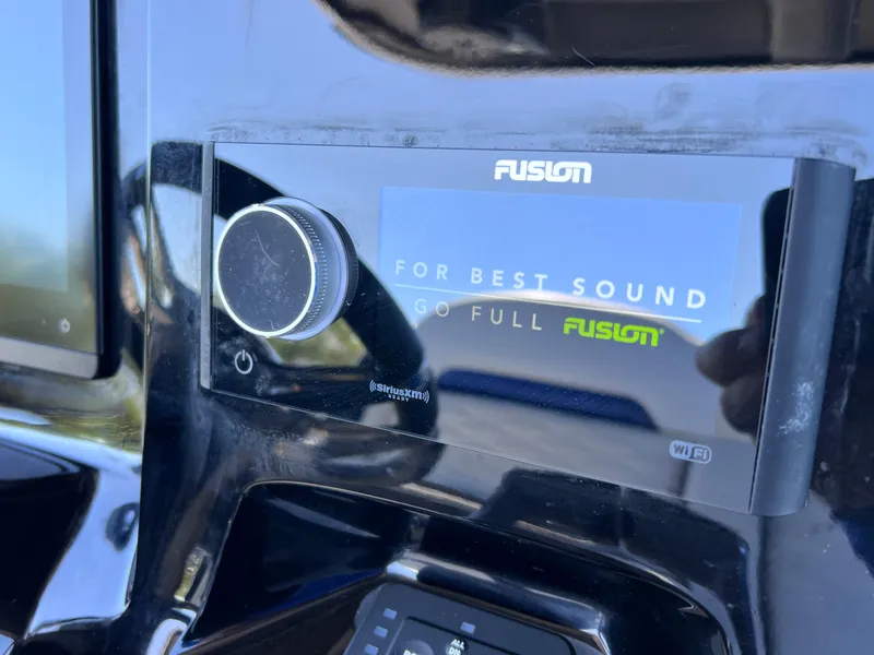 Slide: The Image of Fusion audio system in 2023 Sunsation 32 CCX boat dashboard. - 45