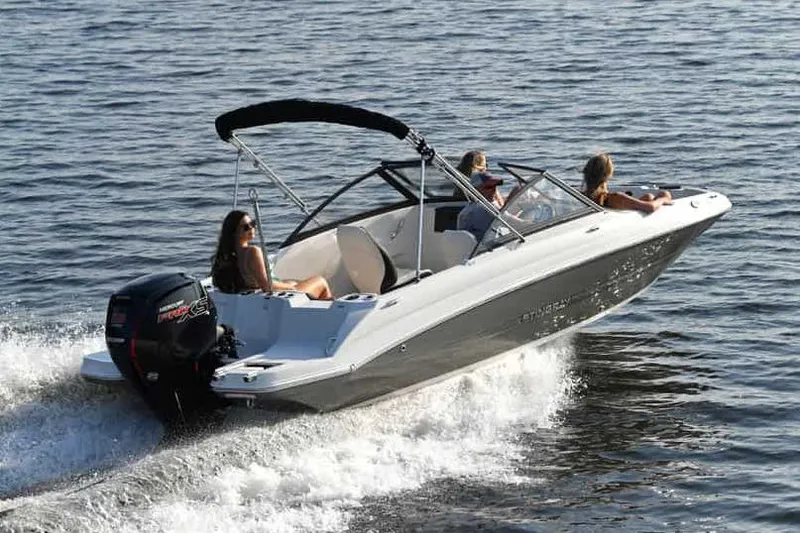 Slide: The Image of Manufacturer Provided Image: 2022 Stingray 191 DC boat cruising on water with passengers. - 5