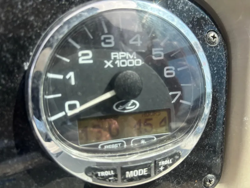 Slide: The Image of Close-up of 2006 Sea Ray 260 Sundancer tachometer showing RPM and hours. - 29