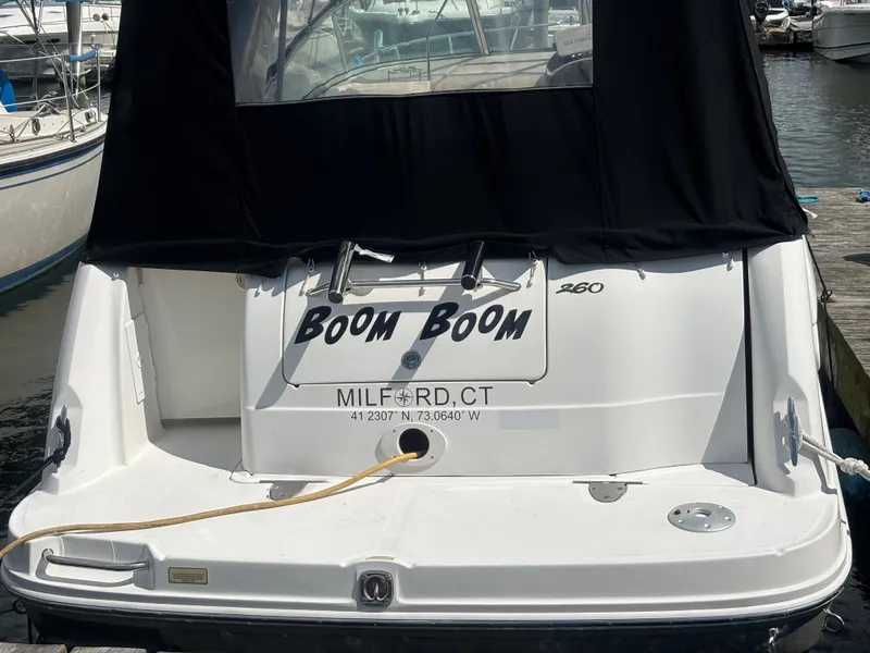Slide: The Image of 2006 Sea Ray 260 Sundancer boat named "Boom Boom" docked in Milford, CT marina. - 5