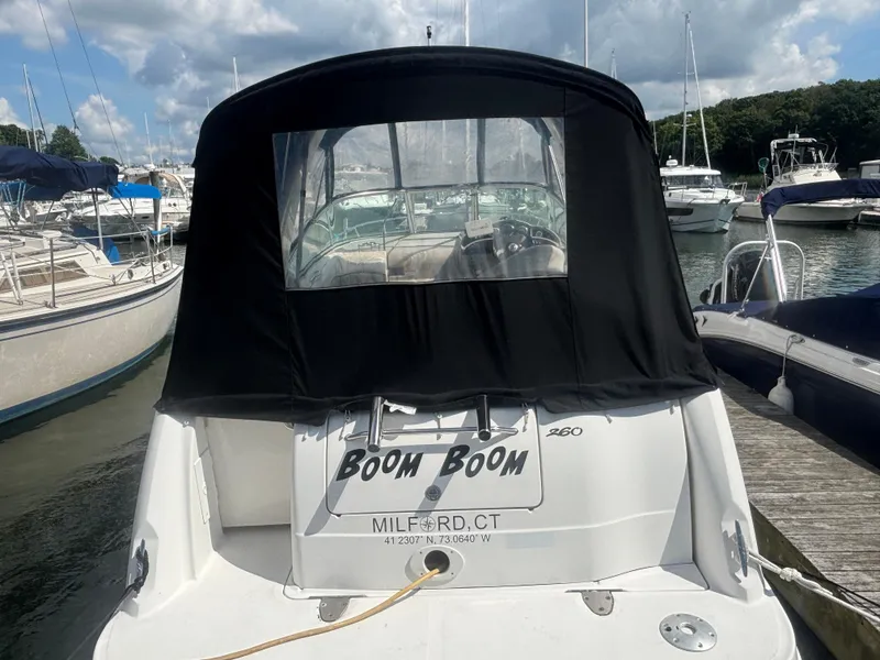 Slide: The Image of 2006 Sea Ray 260 Sundancer docked, rear view with black cover, Milford, CT. - 6
