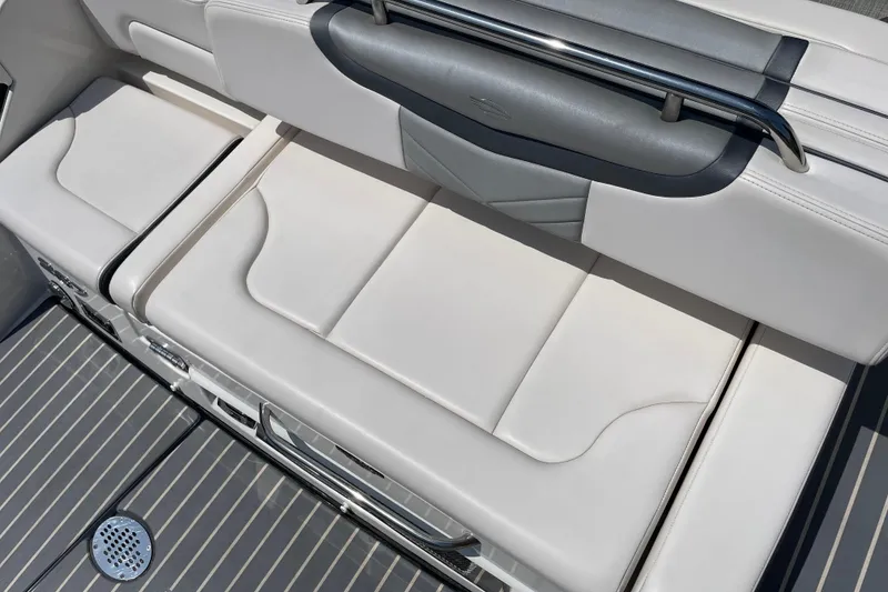 Slide: The Image of 2018 Chaparral 267 SSX boat seating area with sleek, modern design and comfortable upholstery. - 19