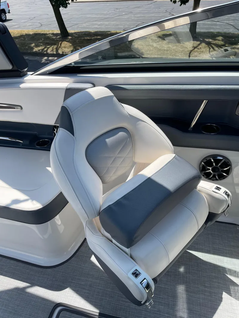 Slide: The Image of 2018 Chaparral 267 SSX boat interior with luxurious seating and modern design. - 9