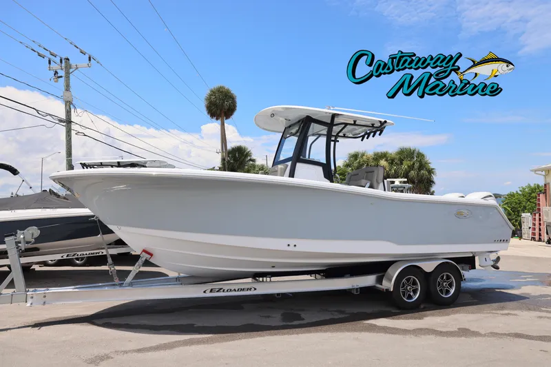 The Image of 2026 Sea Hunt Gamefish 27 Coffin Box boat on trailer at Castaway Marine. - 0
