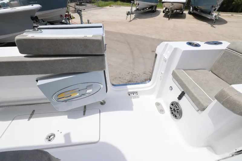 Slide: The Image of 2026 Sea Hunt Gamefish 27 Coffin Box interior with seating and storage compartments. - 15