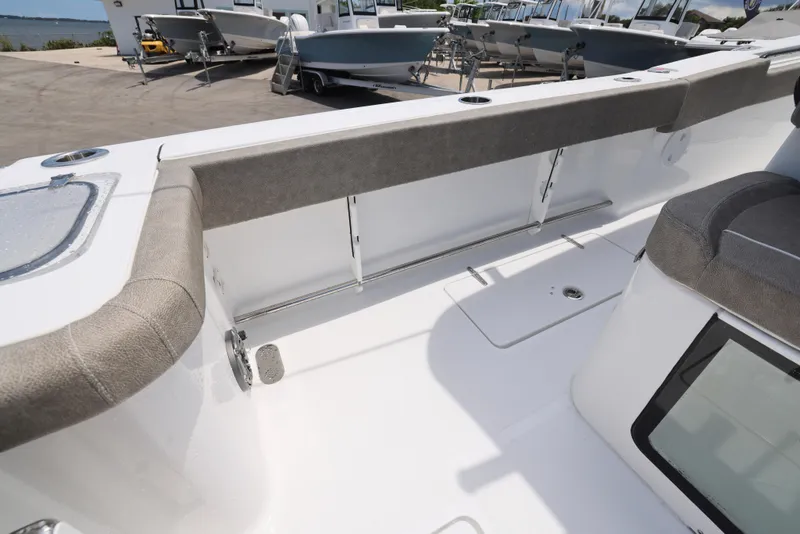 Slide: The Image of 2026 Sea Hunt Gamefish 27 Coffin Box interior, showcasing seating and storage features. - 18