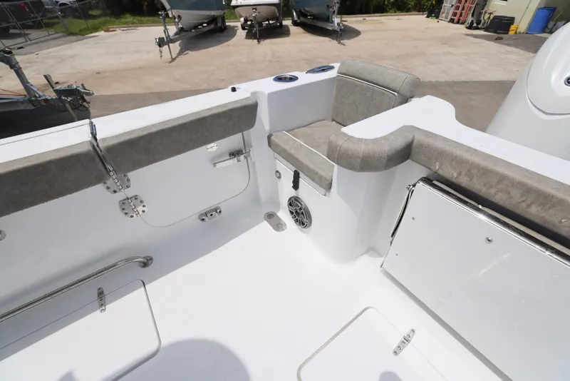 Slide: The Image of 2026 Sea Hunt Gamefish 27 Coffin Box boat interior with seating and storage compartments. - 19