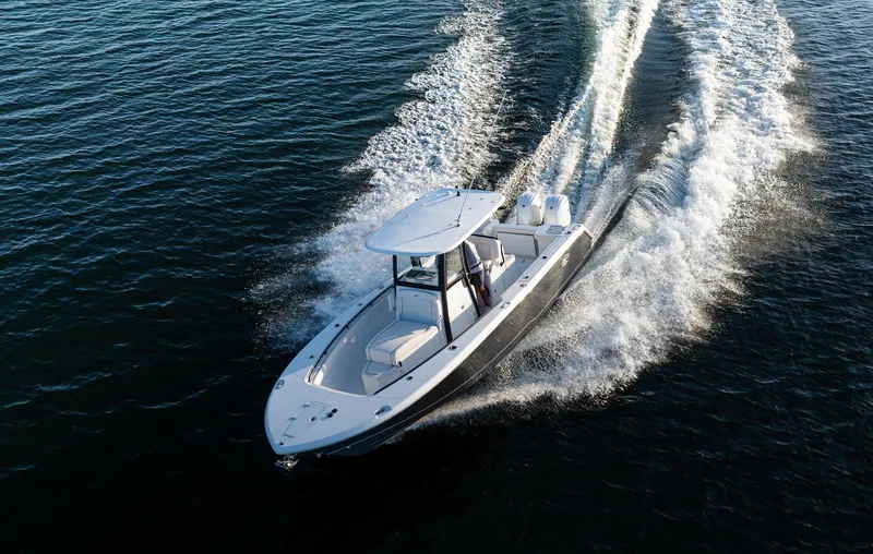 Slide: The Image of 2026 Sea Hunt Gamefish 27 Coffin Box cruising on open water. - 32