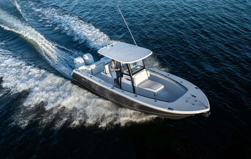 Slide: The Image of 2026 Sea Hunt Gamefish 27 Coffin Box cruising on open water, showcasing sleek design and performance. - 36