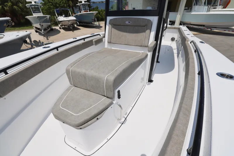 Slide: The Image of 2026 Sea Hunt Gamefish 27 Coffin Box boat interior with cushioned seating. - 5