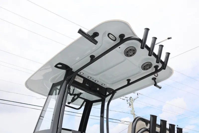 Slide: The Image of T-top view of 2026 Sea Hunt Gamefish 27 Coffin Box with rod holders and speakers. - 9