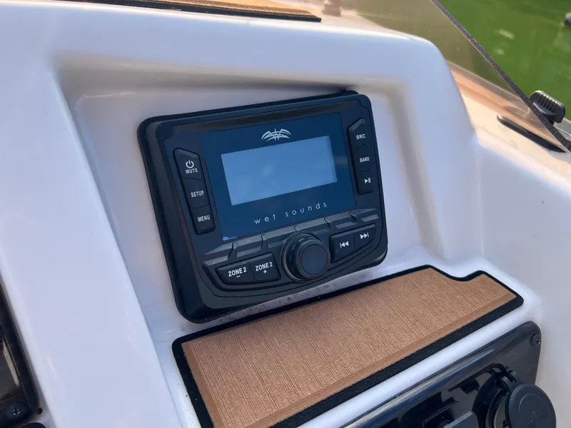 Slide: The Image of 2025 Starcraft SVX 231 IO boat audio system with Wet Sounds control panel. - 9