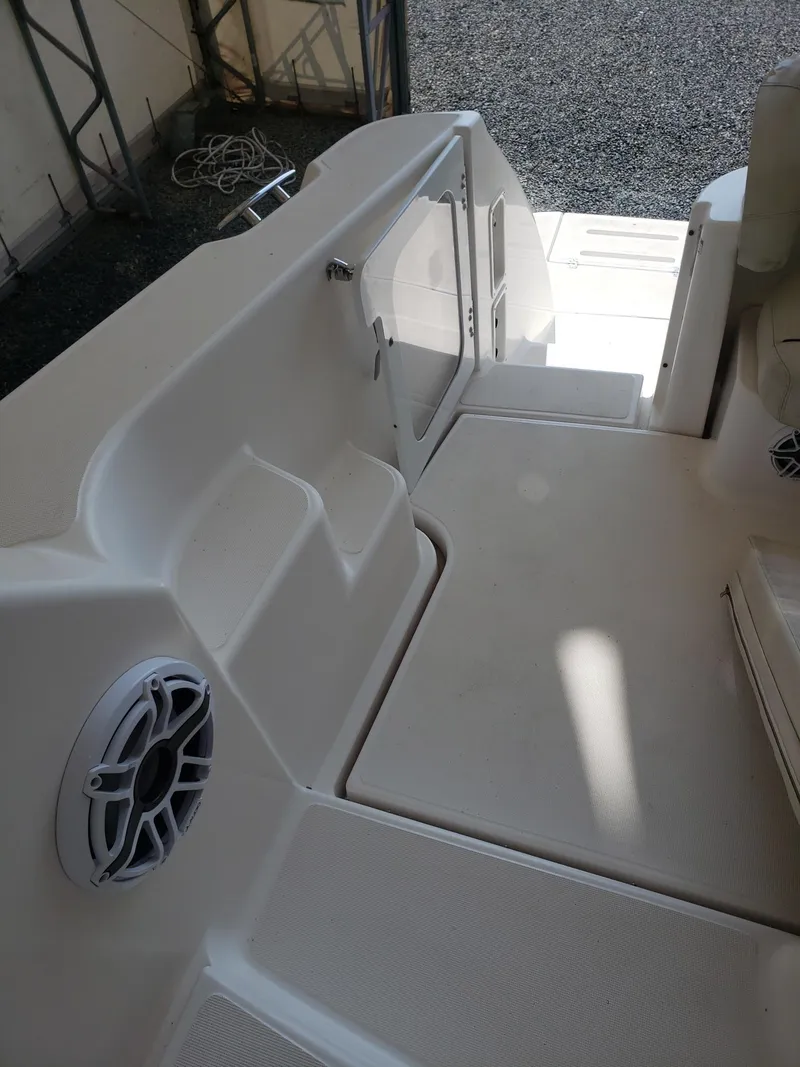 Slide: The Image of 2007 Tiara Yachts 4300 Sovran deck area with speaker and door. - 16