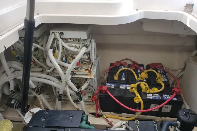 Slide: The Image of Engine compartment of 2007 Tiara Yachts 4300 Sovran with batteries and wiring. - 31