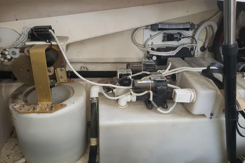 Slide: The Image of Engine compartment of a 2007 Tiara Yachts 4300 Sovran, showcasing mechanical components. - 32