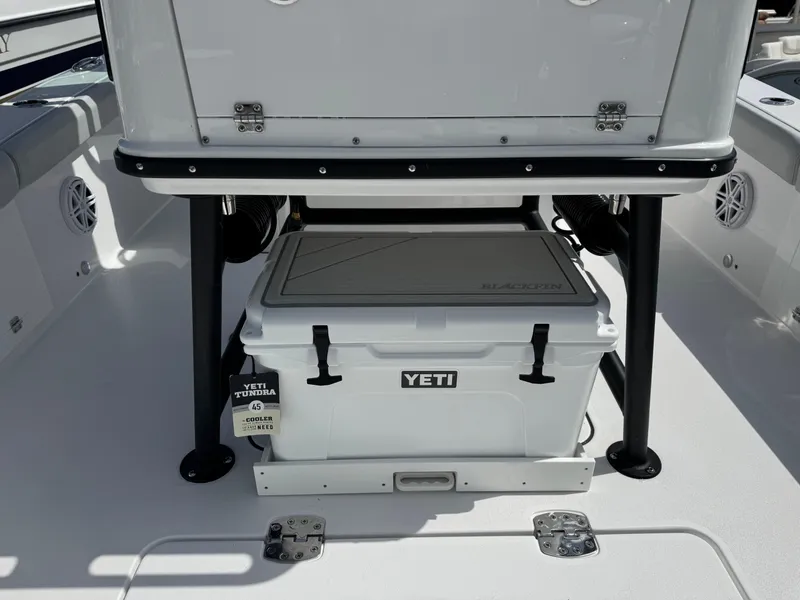 Slide: The Image of 2026 Blackfin 262 HB boat with Yeti Tundra cooler on deck. - 16