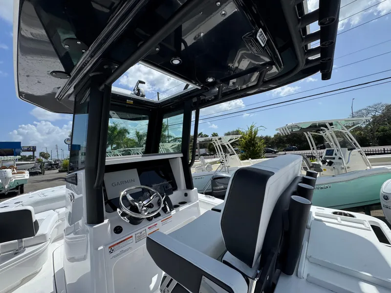 Slide: The Image of 2026 Blackfin 262 HB boat interior with Garmin navigation system and sleek design. - 20