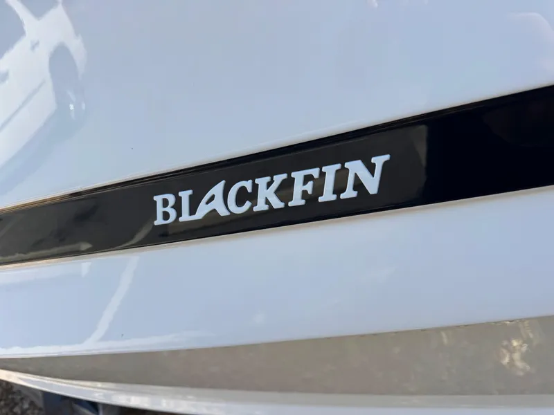 Slide: The Image of Close-up of 2026 Blackfin 262 HB logo on a sleek white surface. - 3