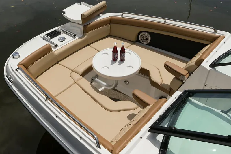 Slide: The Image of Manufacturer Provided Image: 2015 Sea Ray 270 Sundeck Outboard boat with spacious seating and table. - 3