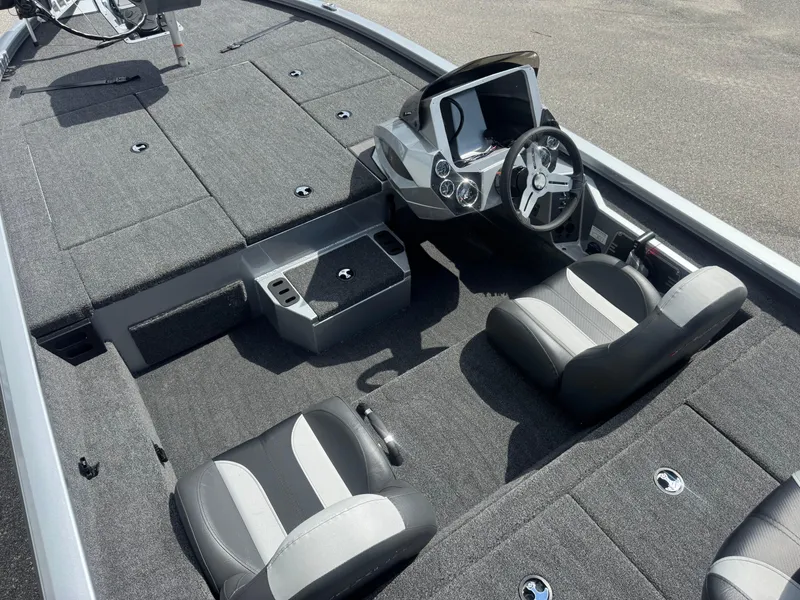 Slide: The Image of 2026 Vexus AVX1880 boat interior with dual seats and steering console. - 11