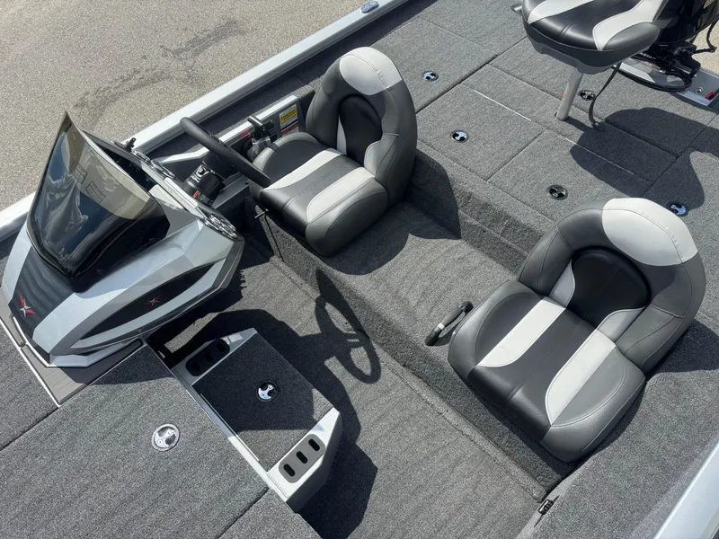 Slide: The Image of 2026 Vexus AVX1880 boat interior with dual seats and steering console. - 9