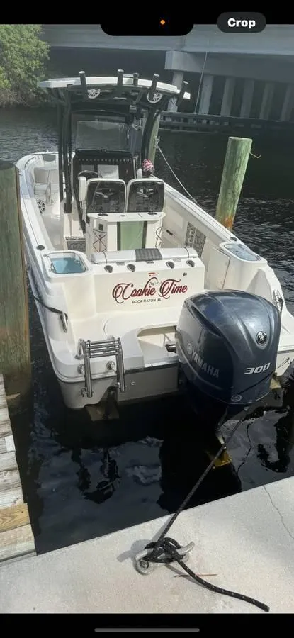 Slide: The Image of 2019 Wellcraft 242 Scarab Offshore boat docked with Yamaha 300 engine. - 6
