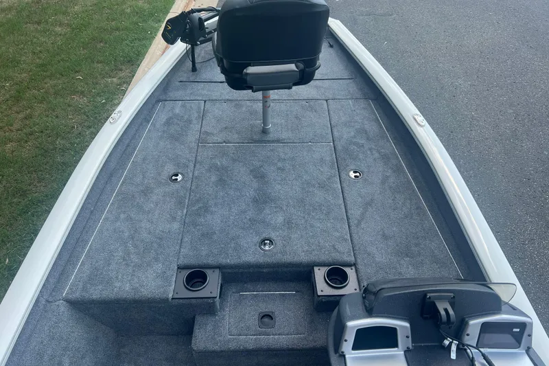 Slide: The Image of 2025 Tracker Pro Team 190 boat interior with seating and storage compartments. - 3