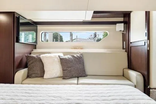 Slide: The Image of Interior of 2017 Regal 42 Grande Coupe with cozy bed and seating area. - 16