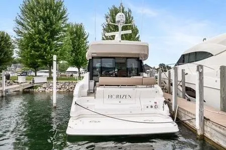 Slide: The Image of 2017 Regal 42 Grande Coupe helm with modern controls and navigation system. - 3