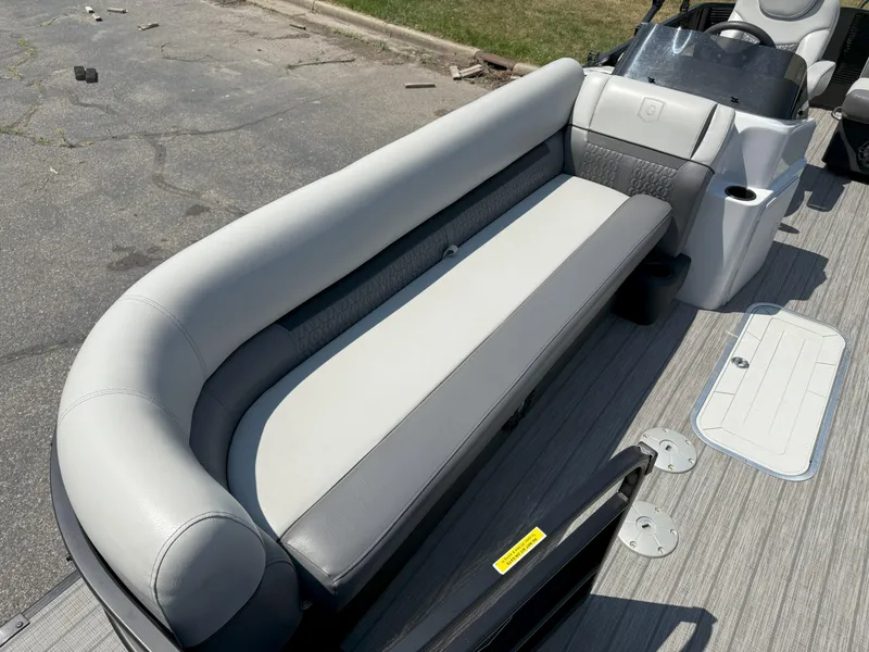 Slide: The Image of 2022 Godfrey Sweetwater 2186 C pontoon boat with gray seating and helm. - 8