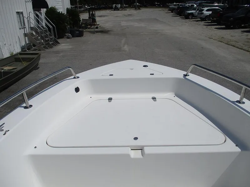 Slide: The Image of 2004 Sea Pro 180 Center Console boat deck with storage compartments. - 10